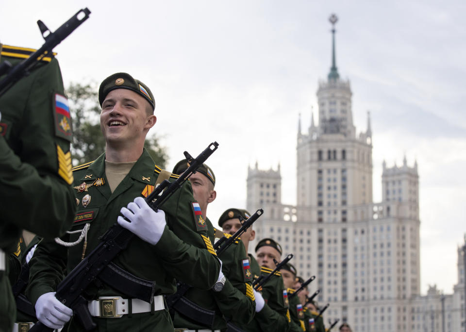 Russian soldiers march toward Red Square to attend a dress rehearsal for the Victory Day military parade in Moscow, Russia, Saturday, June 20, 2020. The military parade marking the 75th anniversary of the Nazi defeat was postponed from May 9 due to the outbreak of the coronavirus pandemic and is now set to take place on June 24. (AP Photo/Alexander Zemlianichenko)