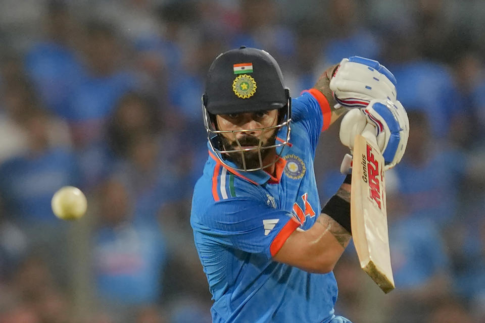 India's Virat Kohli plays a shot during the ICC Men's Cricket World Cup match between Bangladesh and India in Pune, India, Thursday, Oct. 19, 2023. (AP Photo/ Rafiq Maqbool)