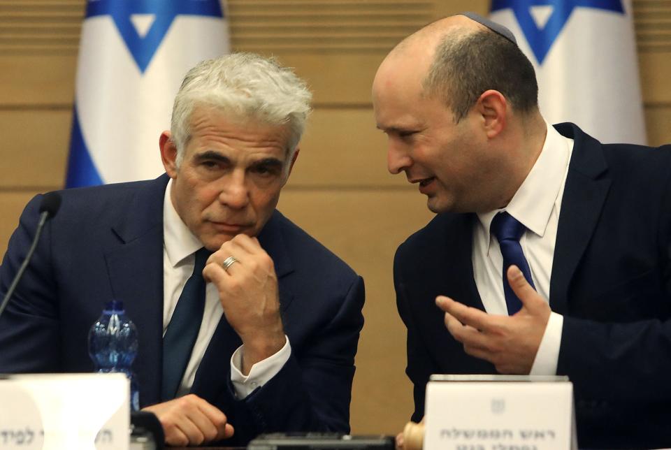 Israel's incoming Prime Minister Naftali Bennett and Alternate Prime Minister and Foreign Minister Yair Lapid (AFP via Getty Images)