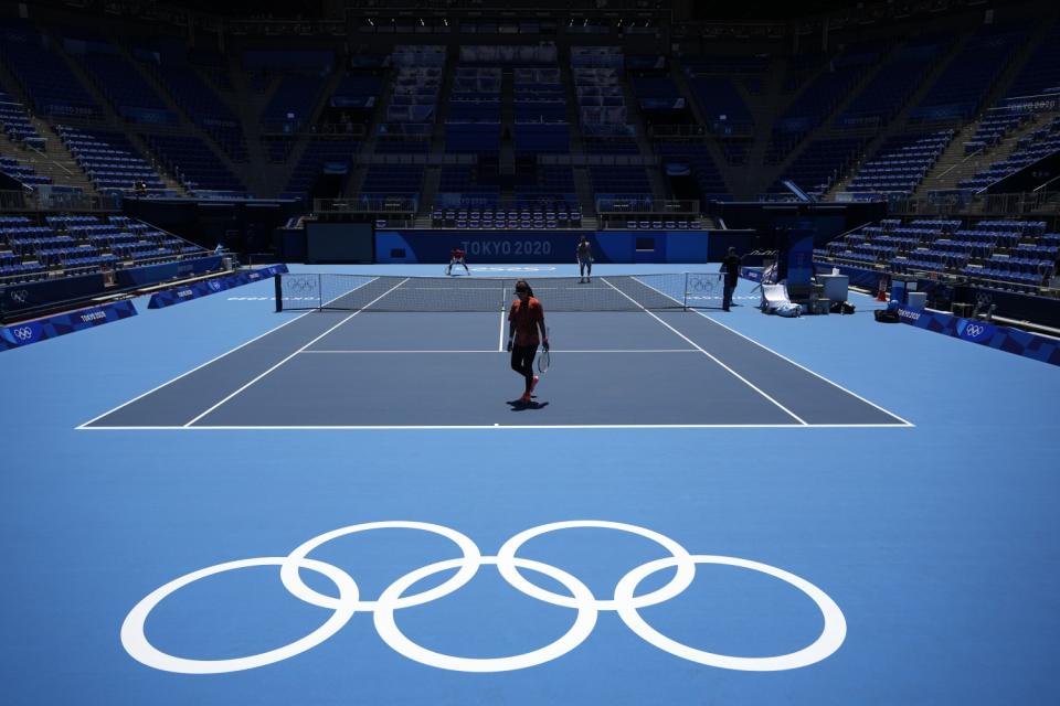 Naomi Osaka on a tennis court