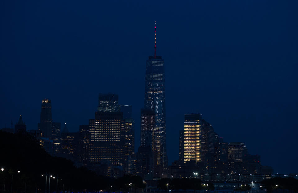 The lights of New York City's One World Trade Center are lit in the colors of the Spanish flag.