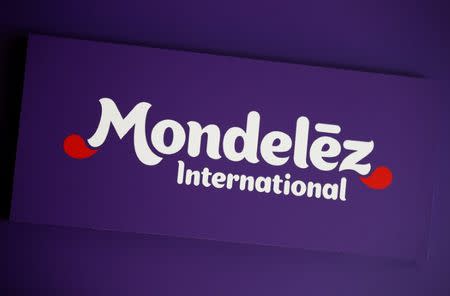 FILE PHOTO - The logo of Mondelez International is pictured at the company's building in Zurich November 14, 2012. REUTERS/Michael Buholzer/File Photo