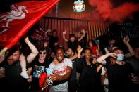 Premier League - Liverpool fans celebrate winning the Premier League