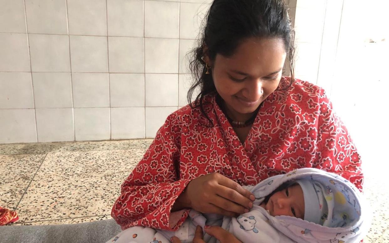 A Nepali mother with her newborn - Srijana Sharma