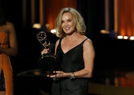 Jessica Lange accepts the award for Outstanding Lead Actress In A Miniseries Or A Movie for her role in "American Horror Story: Coven" during the 66th Primetime Emmy Awards in Los Angeles, California August 25, 2014. REUTERS/Mario Anzuoni
