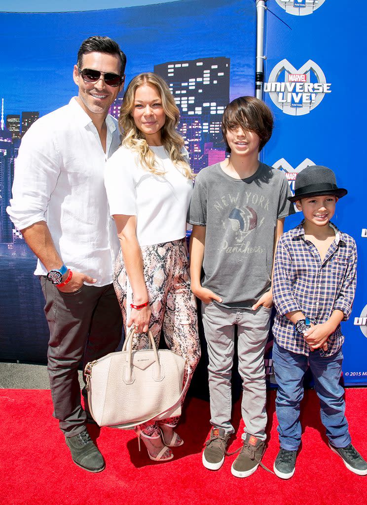 Eddie Cibrian with LeAnn Rimes and his children Mason and Jake attend Marvel Universe LIVE! Celebrity premiere.