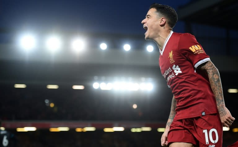 Liverpool's midfielder Philippe Coutinho celebrates scoring on November 18, 2017