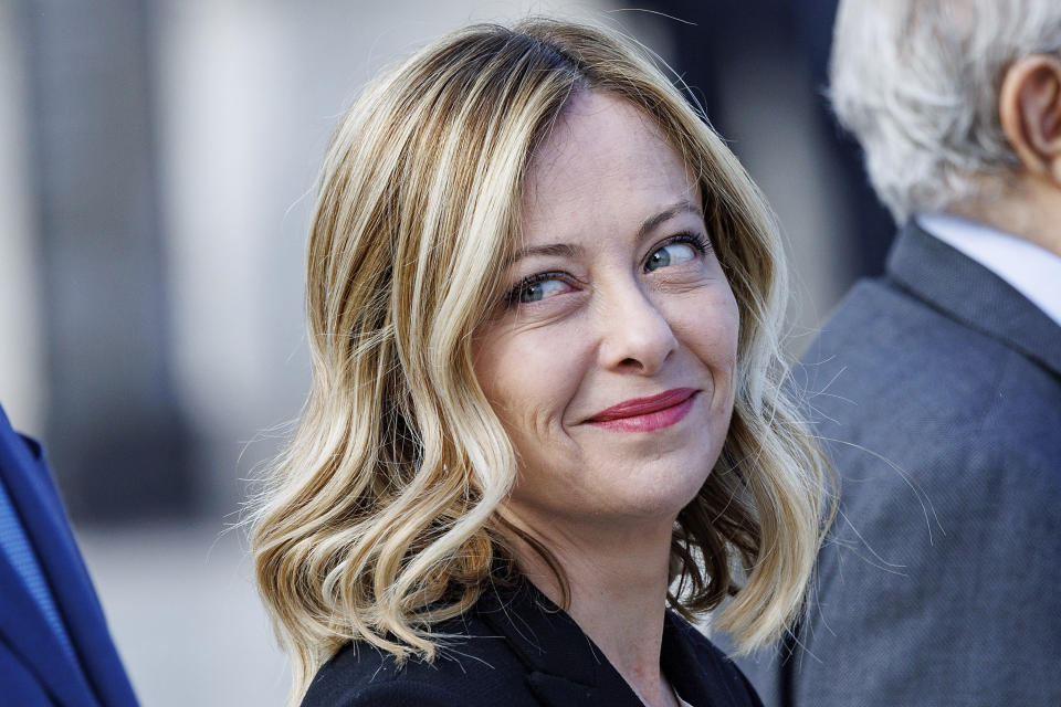 Italian Premier Giorgia Meloni arrives at the tomb of the unknown soldier for the solemn Liberation Day commemoration, in Rome, Thursday, April 25, 2024. Italy is marking its liberation from Nazi occupation and fascist rule amid a fresh media controversy over the legacy of Italian fascist complicity in the Holocaust and World War II-era crimes. Premier Giorgia Meloni, whose Brothers of Italy party traces its roots to the neo-fascist movement that emerged after the fall of dictator Benito Mussolini, joined the Italian president at the tomb of the unknown soldier in Rome. (Roberto Monaldo/LaPresse via AP)