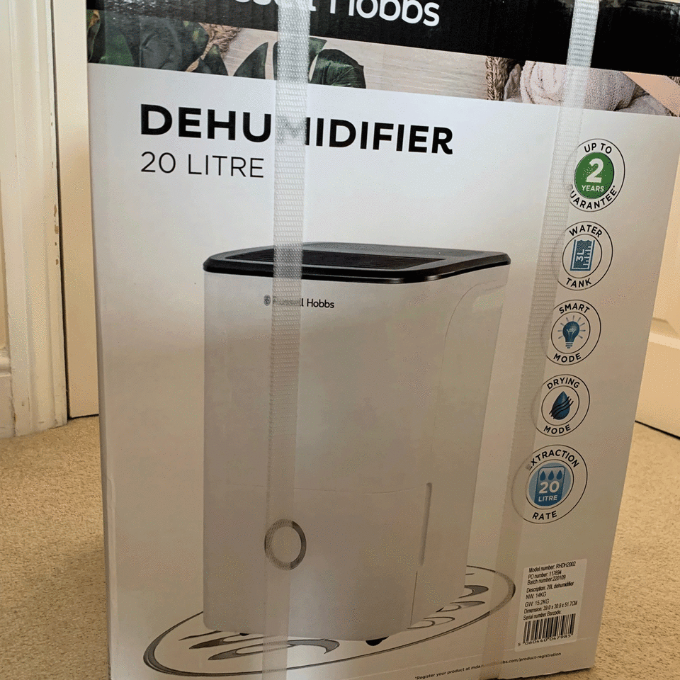 white dehumidifier in cardboard box