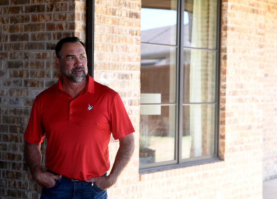 Former Texas Tech football player Ben Kirkpatrick, pictured this month at his home in Lubbock, is looking to brighter days ahead 2 1/2 years after he had a debilitating bout with squamous cell carcinoma.