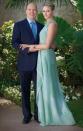 <p>For her royal engagement announcement, Charlene stood in the palace garden showing off her Repossi engagement ring in a backless pale green halter dress from Swiss designer Akris.</p>