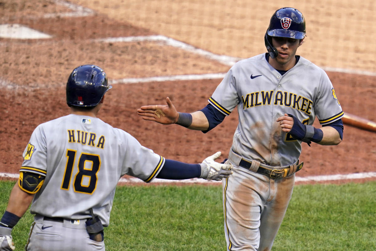 Cain, Woodruff lead Brewers to 4-2 win over Cubs in 10