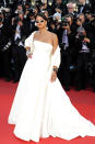 <p>Rihanna fittingly channeled Princess Grace of Monaco in a strapless Dior gown with a matching shawl for the premiere of <em>Okja</em>. However it was the personal details, including Chopard jewels and ’90s sunglasses, that made the ensemble fit for a modern-day pop queen such as herself. (Photo: Giulio Origlia/Getty Images) </p>