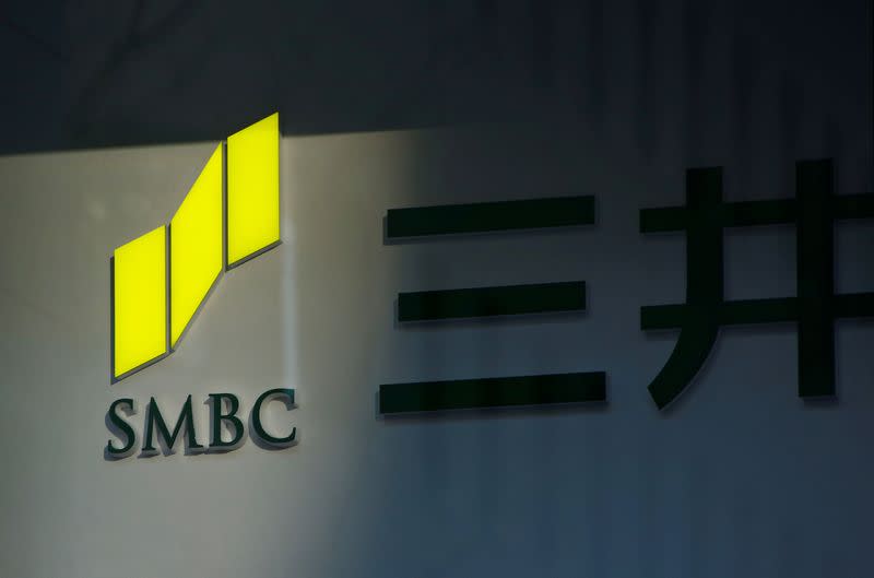 FILE PHOTO: Sumitomo Mitsui Banking Corporation's signboard is pictured at its branch in Tokyo