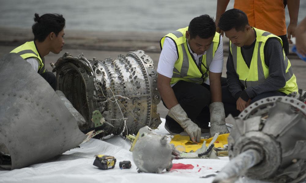 Investigators examine engine parts from Lion Air flight JT 610.