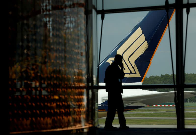 A Singapore Airlines plane sits on the tarmac at Singapore's Changi Airport