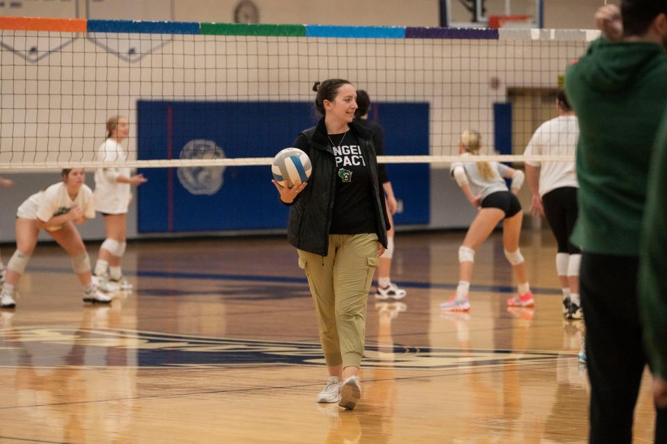 University of Wisconsin-Parkside women's volleyball head coach Leigh Barea works with players at Harper Creek High School on Thursday, Nov. 9, 2023.