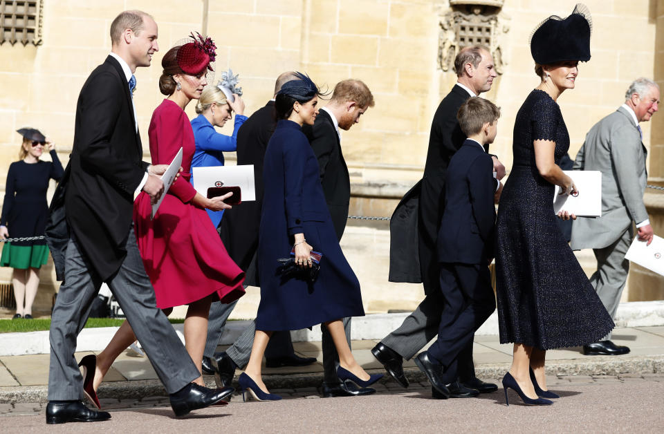 FILE - In this Friday, Oct. 12, 2018 file photo, Prince William, Kate Duches of Cambridge, Meghan, Duchess of Sussex, Prince Harry, Prince Edward, Sophie, Countess of Wessex, and Prince Charles, from left, walk back following the wedding of Princess Eugenie of York and Jack Brooksbank in St George's Chapel, Windsor Castle, near London. King Charles III will hope to keep a lid on those tensions when his royally blended family joins as many as 2,800 guests for the new king’s coronation on May 6 at Westminster Abbey. All except Meghan, the Duchess of Sussex, who won’t be attending. (AP Photo/Alastair Grant, Pool, File)