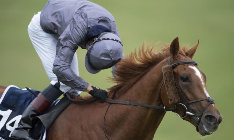 Emmet McNamara looks round for non-existent dangers as he romps home on Serpentine in the Derby .