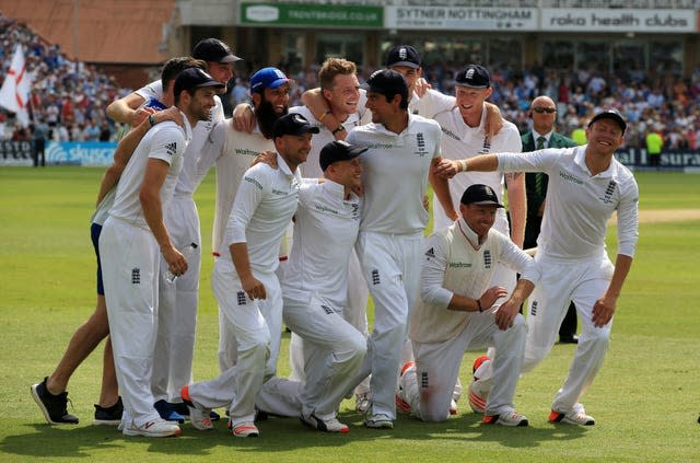 Ashes winning England captain Alastair Cook looks back at his team mates as they celebrate winning the Ashes