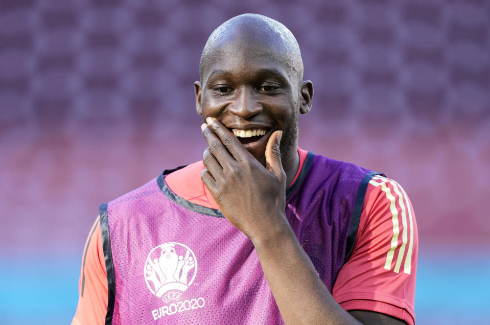 Belgium's Romelu Lukaku smiles during a team training session at Parken stadium in Copenhagen, Denmark, Wednesday, June 16, 2021 the day before the Euro 2020 soccer championship group B match between Denmark and Belgium. (AP Photo/Martin Meissner)