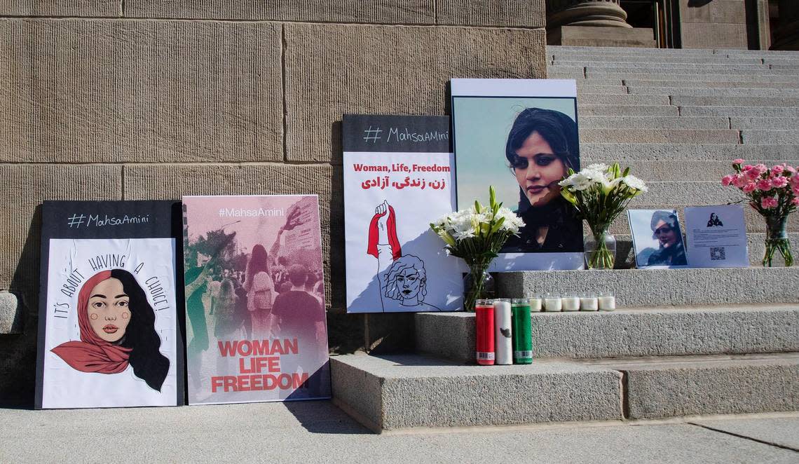 A small memorial for Mahsa Amini, a 22-year-old woman who was taken into custody for allegedly disobeying the nation’s dress code for women is assembled on the steps of the Idaho Capitol during a rally held by members of Boise’s Iranian-American community and supporters, on Saturday, Oct. 1, 2022.