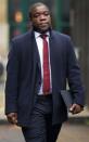 Former UBS banker Kweku Adoboli arrives at Southwark Crown Court in London. Adoboli, who gambled away $2.3 billion of the Swiss bank's money, was convicted of Britain's biggest ever fraud