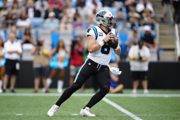 Carolina Panthers quarterback Baker Mayfield (6) sets back to pass during the first half of an NFL football game against the New Orleans Saints, Sunday, Sept. 25, 2022, in Charlotte, N.C. (AP Photo/Jacob Kupferman)
