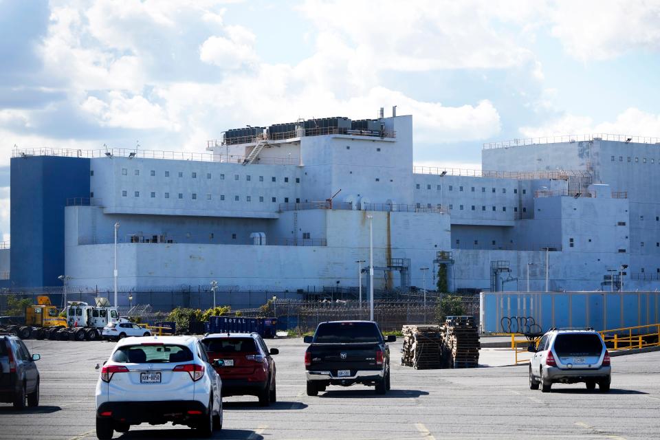 Photo of cars driving up to the Vernon C. Bain Correctional Center.