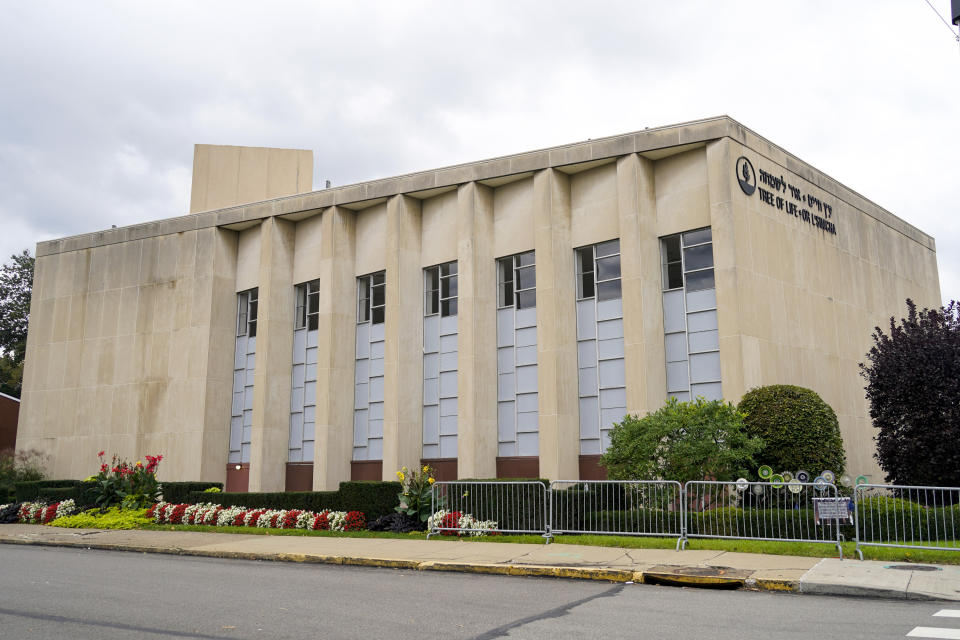 This photo from Oct. 16, 2021, shows the dormant landmark Tree of Life synagogue in Pittsburgh's Squirrel Hill neighborhood. Renowned architect Daniel Libeskind is among those working to transform the site to share space with the Holocaust Center of Pittsburgh. The goal to create a solemn memorial as well as a place of regular activity is underway as the date marking the third year since 11 people were killed in America's deadliest antisemitic attack on Oct. 27, 2018 approaches. (AP Photo/Keith Srakocic)