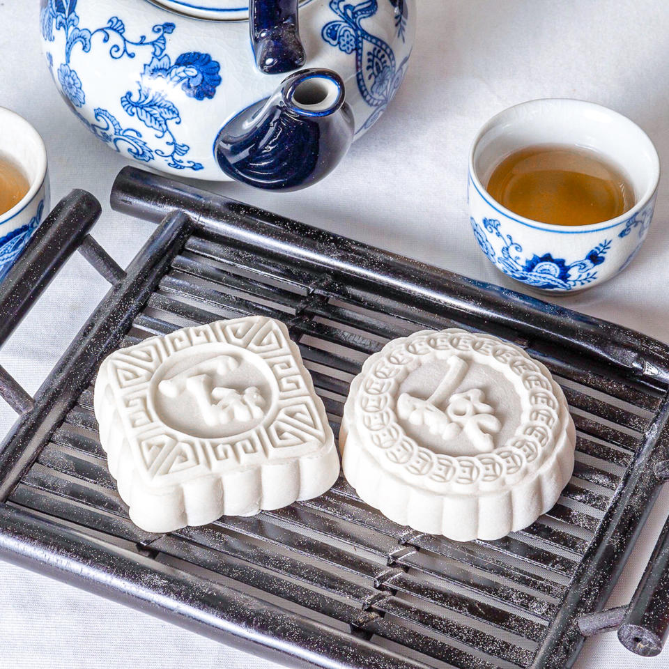 Snow skin mooncakes, like the two pictured, are no-bake pastries. (Courtesy Suzanne Nuyen)