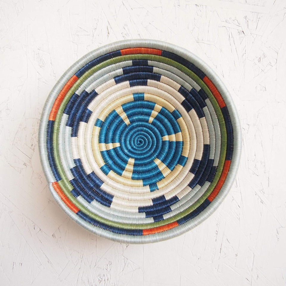 <h2>Amsha</h2><br>We think your living space could use one of these vibrantly hand-woven African bowls. <br><br><strong>Amsha</strong> Mwangaza/Rwanda Woven Bowl, $, available at <a href="https://amzn.to/3c1SMKr" rel="nofollow noopener" target="_blank" data-ylk="slk:Amazon" class="link ">Amazon</a>