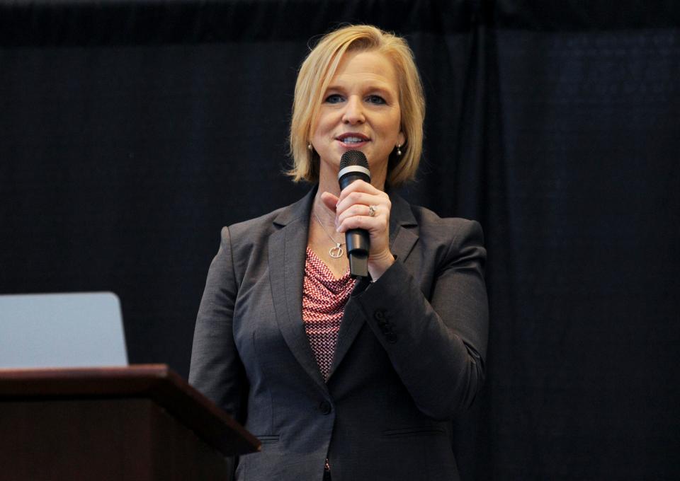 Amy Canterbury gives a speech after being announced as the new CEO of United Way at the Ford Center on Friday, Dec. 11, 2015.