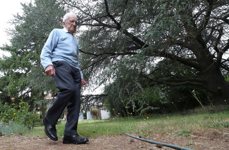 Alfons Leempoels walks the equivalent of a marathon in his garden to raise money to fight against the coronavirus disease (COVID-19) in Rotselaar