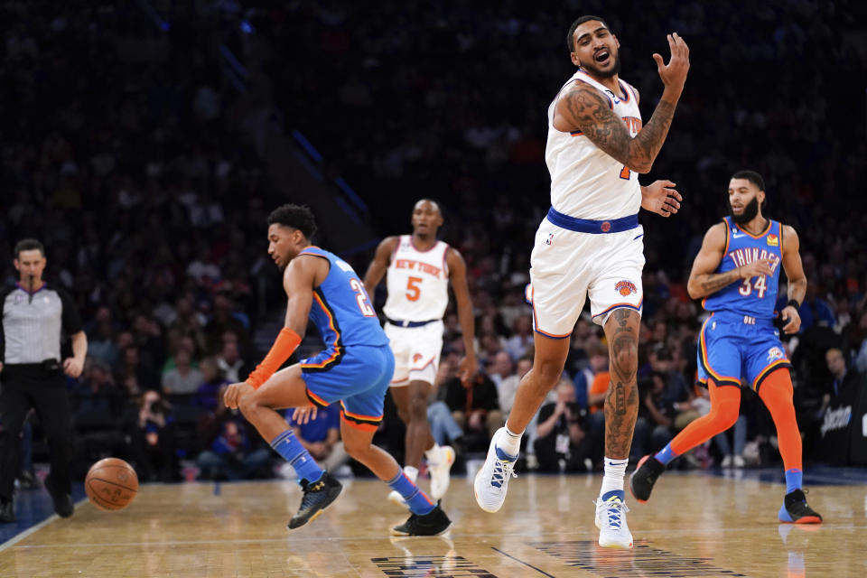 New York Knicks forward Obi Toppin (1) reacts after losing the ball to Oklahoma City Thunder guard Shai Gilgeous-Alexander (2) during the first half of an NBA basketball game, Sunday, Nov. 13, 2022, in New York. (AP Photo/Julia Nikhinson)