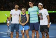 Canada's Milos Raonic, Switzerland's Roger Federer, Serbia's Novak Djokovic and Australia's Daria Gavrilova (2nd L) attend a promotional event ahead of the Australian Open tennis tournament in Melbourne, Australia, January 14, 2017. REUTERS/Edgar Su