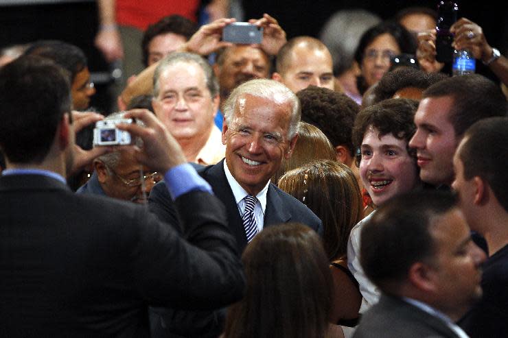 Vice President Joe Biden greets supporters Monday, Aug. 13, 2012, during a rally at the Durham Armory in Durham, N.C. (AP Photo/The News & Observer, Travis Long) MANDATORY CREDIT