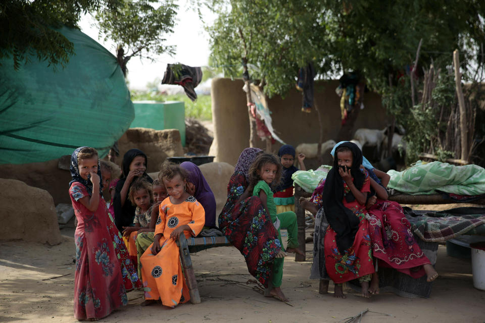 FILE - In this Oct. 7, 2016 file photo, girls gather at a camp for internally displaced people near the town of Abs, in the Hajjah governorate, of Yemen. The U.N. Office for the Coordination of Humanitarian Affairs, or OCHAU.N. warned in a report Tuesday, March 12, 2019, that thousands of Yemeni civilians caught in fierce clashes between warring factions are trapped in the embattled northern district of Hajjah. The number of displaced in the district has doubled over the past six months, the humanitarian agency said. (AP Photos Hani Mohammed, File)