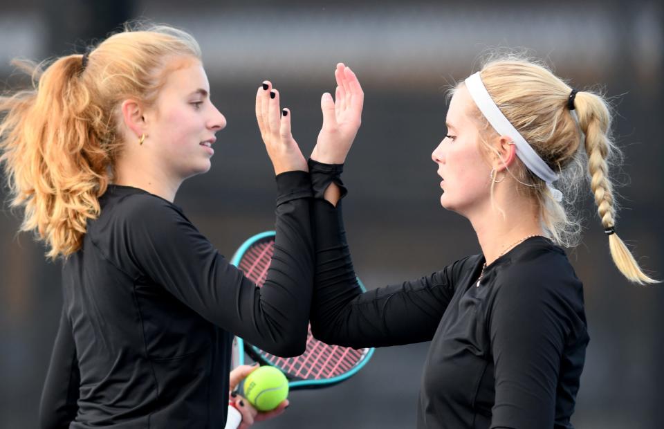 Hoover's Bridget Fink and Cecilia Holben  compete against Jackson's Madison Altman and Paige Reese in OHSAA Northeast Ohio Girls D1 Sectional Tournament Doubles Semifinal at Jackson North Park.  Saturday, October 09, 2022.