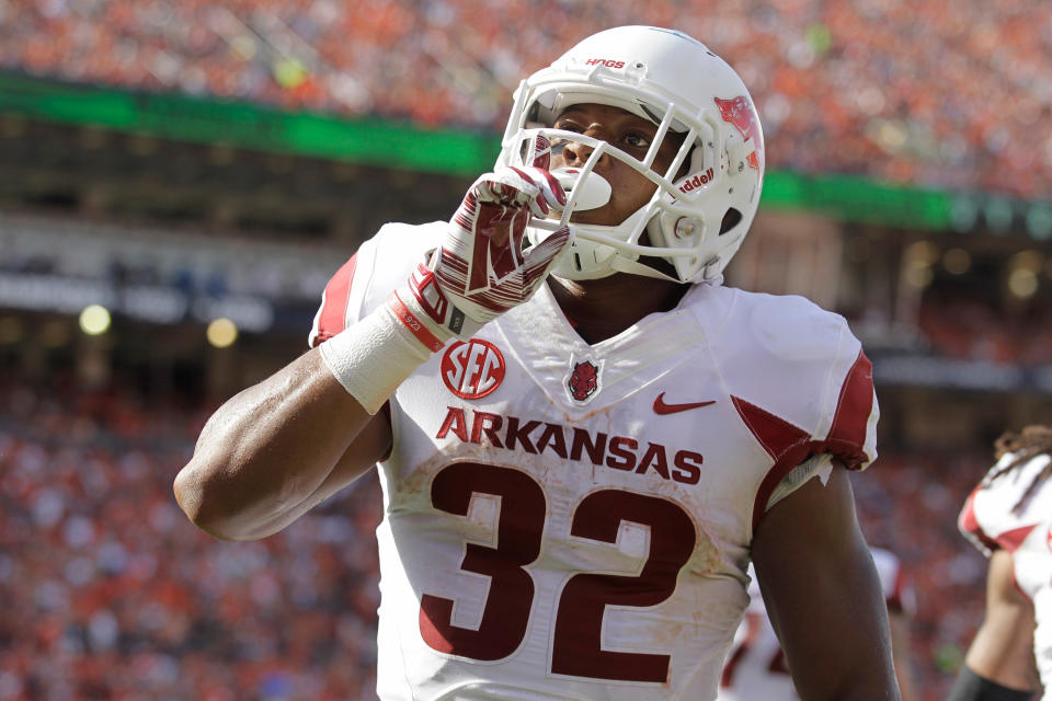 Aug 30, 2014; Auburn, AL, USA; Arkansas Razorbacks running back Jonathan Williams (32) celebrates after scoring a touchdown against the Auburn Tigers during the first half at Jordan Hare Stadium. Mandatory Credit: John Reed-USA TODAY Sports