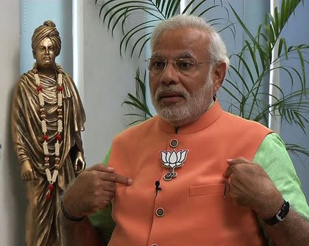 Hindu nationalist Narendra Modi, the prime ministerial candidate for India's main opposition Bharatiya Janata Party (BJP), speaks during an interview with the ANI television service at Gandhinagar in Gujarat in this still image taken from video April 16, 2014. REUTERS/ANI/Handout via Reuters