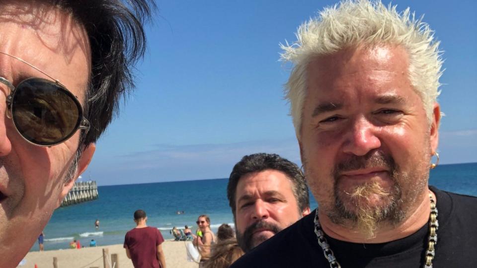 Richard J Guercio poses with Guy Fieri on Lake Worth Beach on Friday, Feb. 26.