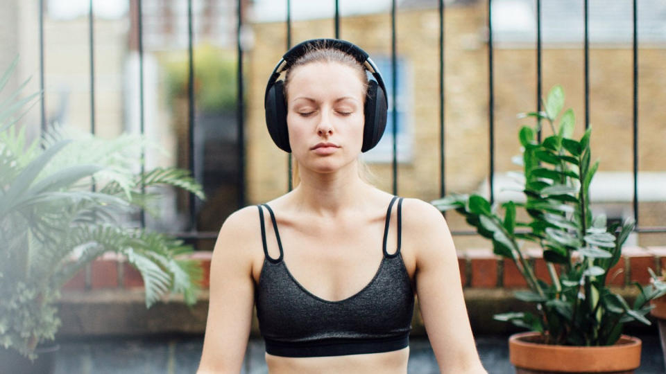 Woman wearing Kokoon Relax Headphones