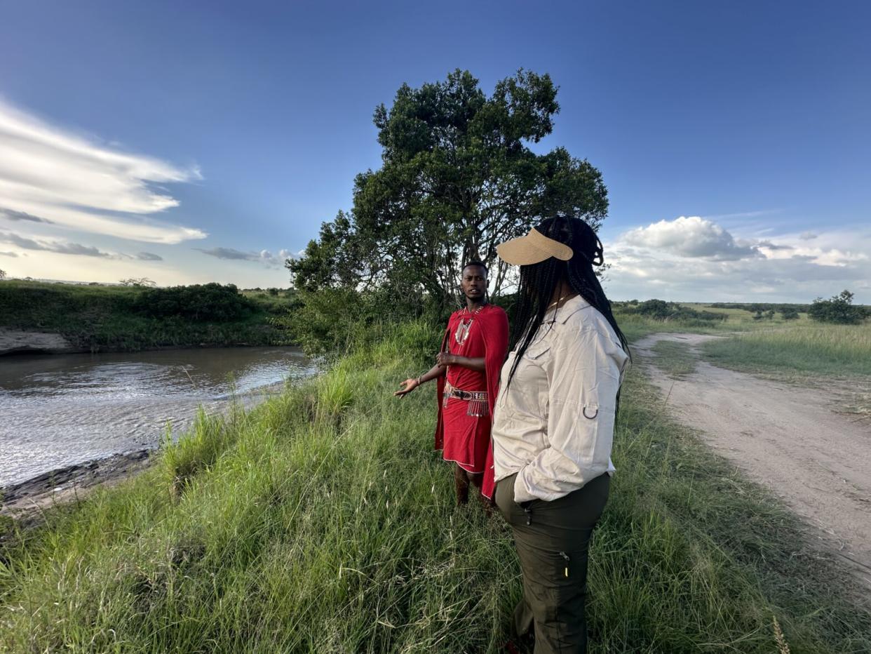 two people taking in the Maasai Mara National Reserve Safari in Kenya