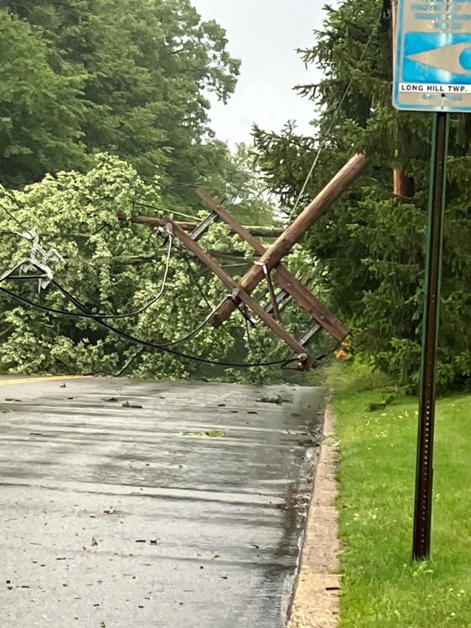 Storm damage in Long Hill, in a photo captured by a utility crew, after intense rains and thunderstorms rolled through the area