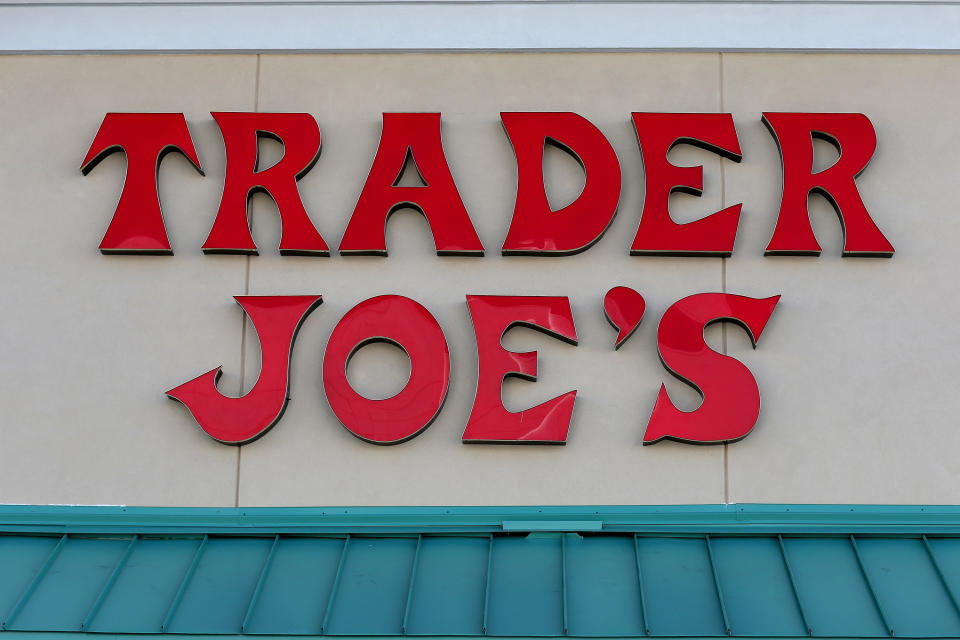 Red Trader Joe's sign in front of store.