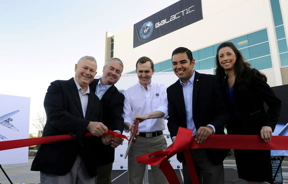 Virgin Galactic's CEO George Whitesides is joined by (from left) California Congressman Dana Rohrabacher, California Assemblyman Patrick O'Donnell, Long Beach Mayor Robert Garcia and Long Beach Council Member Stacy Mungo as they officially open