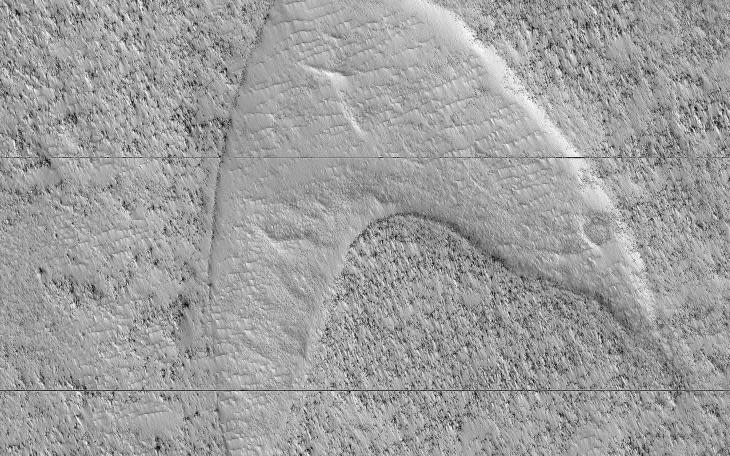 These curious chevron shapes in southeast Hellas Planitia are the result of a complex story of dunes, lava, and wind.  