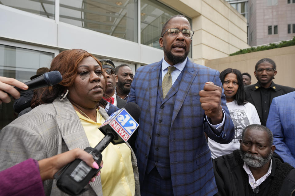 Civil lead counsel Malik Shabazz, right, stands with Rankin County NAACP president Angela English, left, and speaks on the federal sentencing of the sixth former Rankin County law enforcement officer, former Richland, Miss., police officer Joshua Hartfield, to 10 years in federal prison for his role with five other former Rankin County Sheriff's Department deputies in the racially motivated, violent torture of Michael Corey Jenkins and his friend, Eddie Terrell Parker, Thursday, March 21, 2024, at the federal courthouse in Jackson, Miss. The judge gave sentences near the top of federal guidelines to the former deputies. (AP Photo/Rogelio V. Solis)