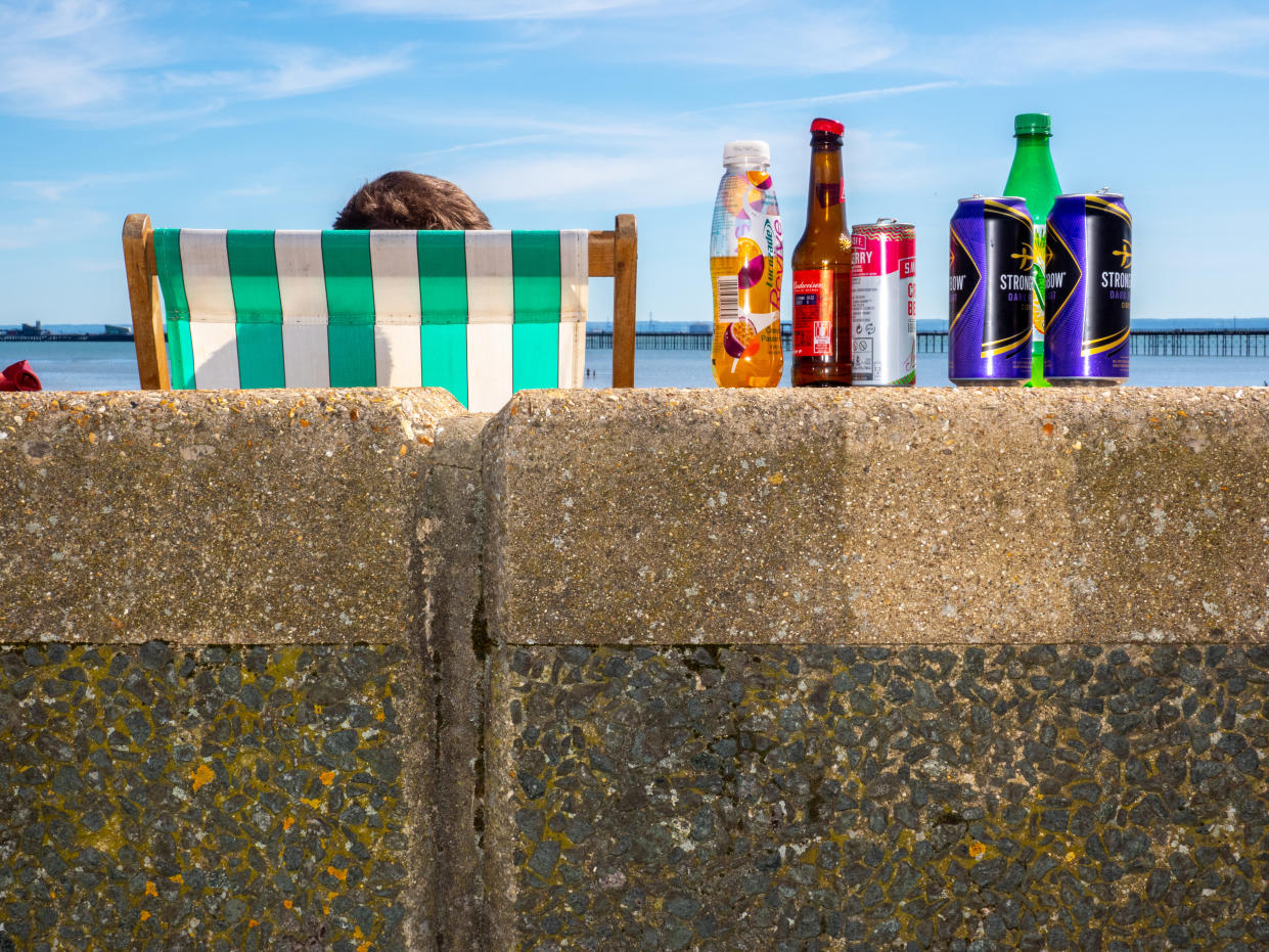SOUTHEND, ENGLAND - MAY 20: Empty alcohol containers on the wall next to the beach on May 20, 2020 in Southend, United Kingdom. Parts of the country were expected to reach 29 degrees celsius, luring sunbathers and testing the capacity of parks and beaches to accommodate social distanced crowds. (Photo by Peter Dench/Getty Images)